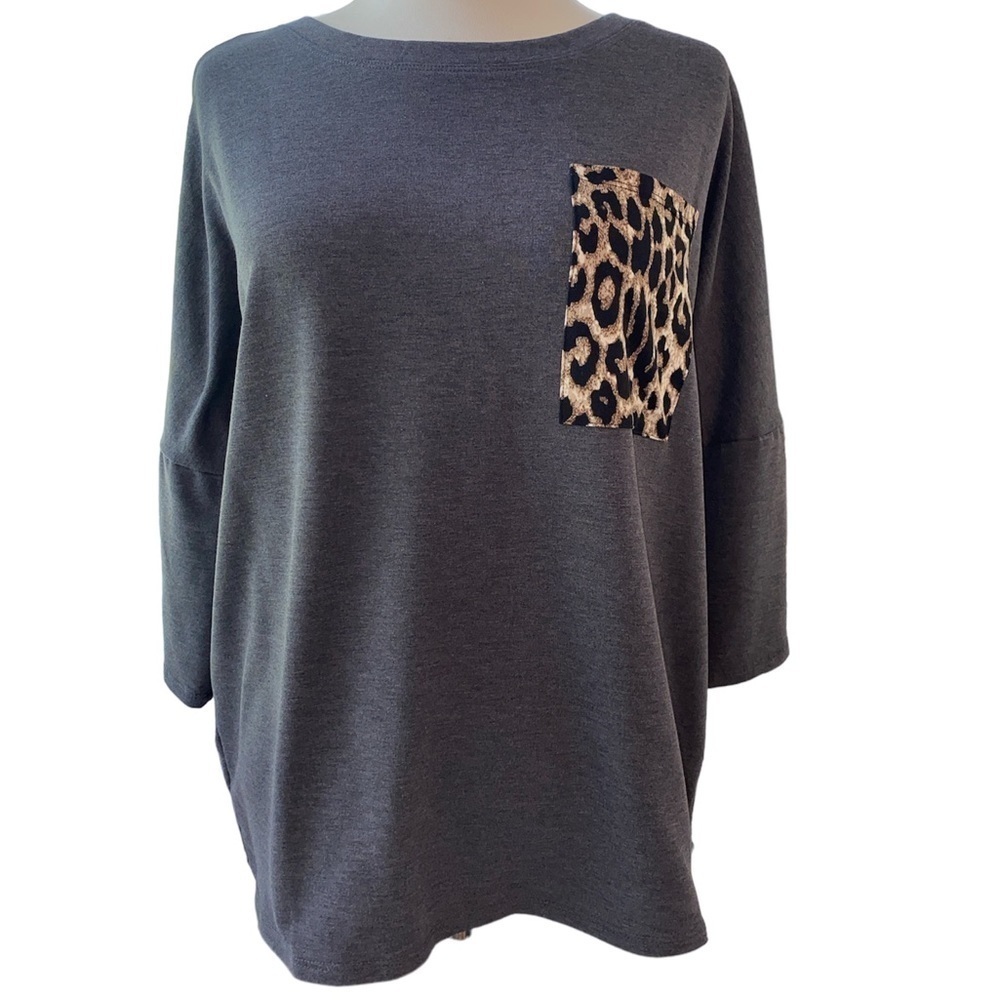Shop Basic USA blouse short sleeve rounded neckline animal print pocket Sz large